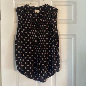 Kate Spade 100% silk sleeveless blouse, size XL. Black with small flowers on it
